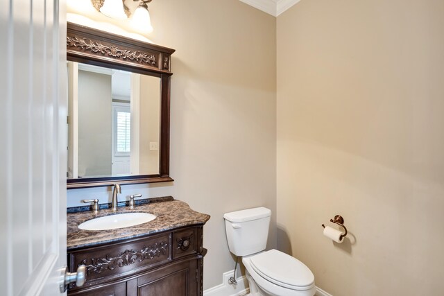 250 Ridgewood Dr, Piperton, TN 38017 - bathroom with crown molding, vanity, toilet, and baseboards