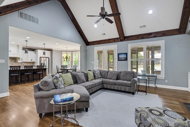 250 Ridgewood Dr, Piperton, TN 38017 - living area featuring visible vents, baseboards, and ceiling fan with notable chandelier
