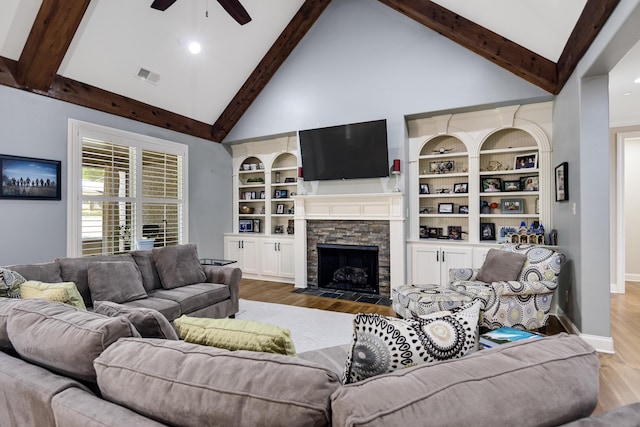 250 Ridgewood Dr, Piperton, TN 38017 - living room with high vaulted ceiling, wood finished floors, ceiling fan, beamed ceiling, and visible vents