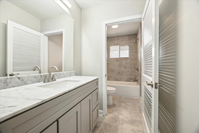 5676 Walnut Grove Pl, Memphis, TN 38120 - bathroom featuring toilet, vanity, and shower / bath combination