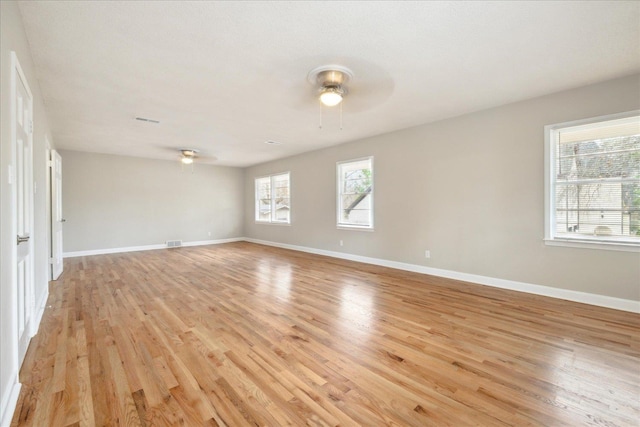 5676 Walnut Grove Pl, Memphis, TN 38120 - spare room with light wood-style flooring, visible vents, baseboards, and ceiling fan
