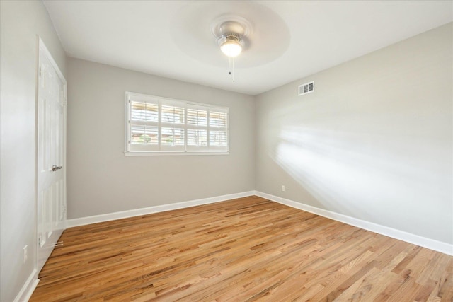 5676 Walnut Grove Pl, Memphis, TN 38120 - spare room featuring ceiling fan, baseboards, light wood finished floors, and visible vents