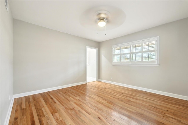 5676 Walnut Grove Pl, Memphis, TN 38120 - unfurnished room with ceiling fan, baseboards, visible vents, and light wood-style flooring