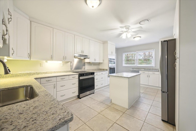 5676 Walnut Grove Pl, Memphis, TN 38120 - kitchen featuring a sink, ceiling fan, stainless steel appliances, white cabinets, and under cabinet range hood