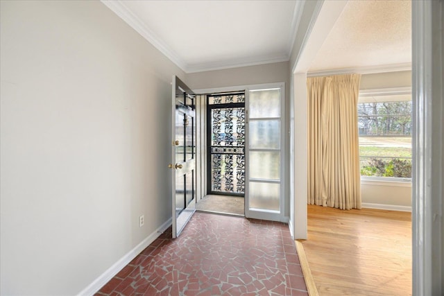 5676 Walnut Grove Pl, Memphis, TN 38120 - doorway to outside featuring crown molding and baseboards