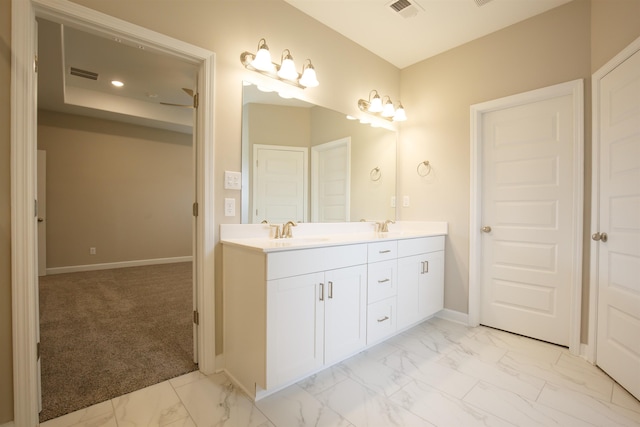 8763 Shipp Cv, Millington, TN 38053 - full bath featuring a sink, double vanity, visible vents, baseboards, and marble finish floor