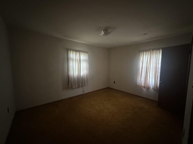 view of carpeted spare room