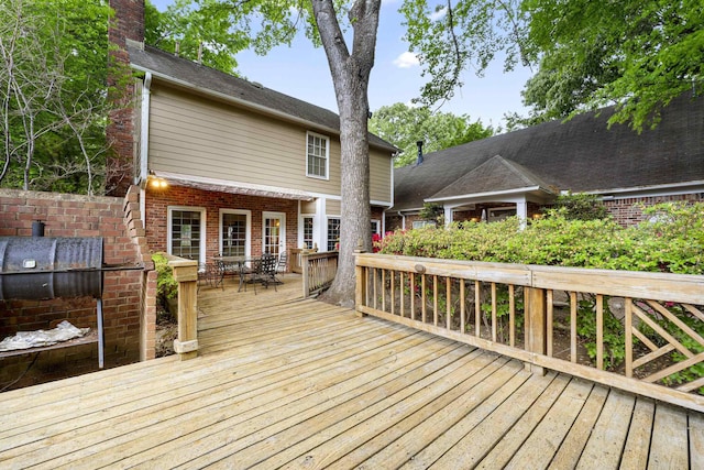 deck featuring outdoor dining space