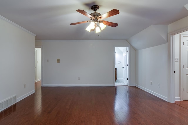 bonus room with wood finished floors, visible vents, a ceiling fan, and baseboards