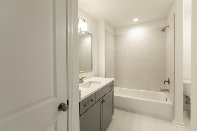 bathroom featuring toilet, bathtub / shower combination, recessed lighting, tile patterned flooring, and vanity