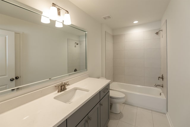 bathroom with toilet, visible vents, shower / bath combination, tile patterned flooring, and vanity