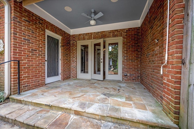 view of patio with ceiling fan and french doors