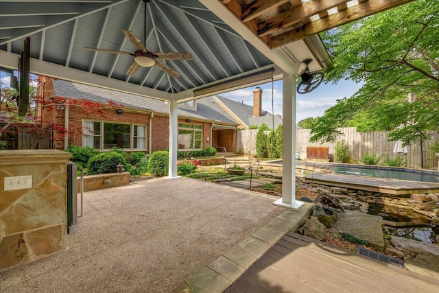 view of patio / terrace featuring visible vents, ceiling fan, and fence