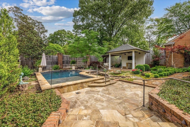 view of pool with a fenced backyard, an outbuilding, a patio area, and a fenced in pool