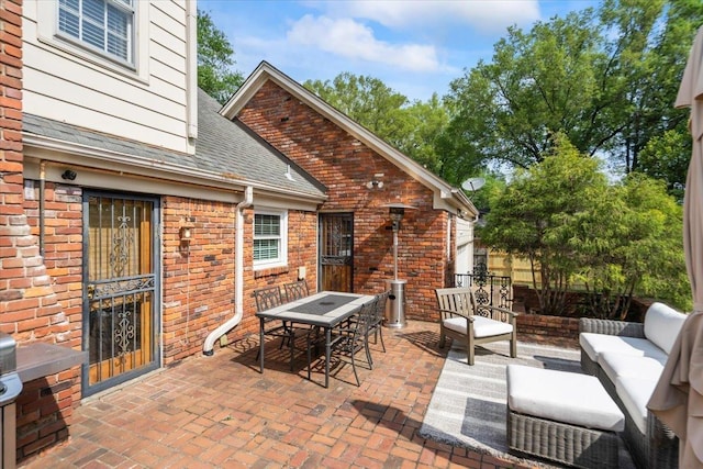 view of patio featuring fence, outdoor lounge area, and outdoor dining area