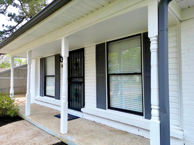 property entrance featuring covered porch