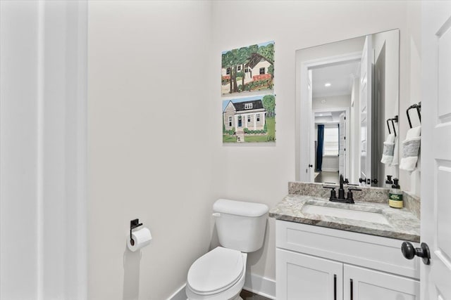 428 Catawba Valley Dr, Collierville, TN 38017 - half bathroom featuring baseboards, vanity, and toilet