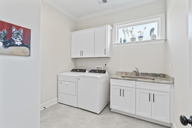428 Catawba Valley Dr, Collierville, TN 38017 - laundry area with visible vents, a sink, washing machine and dryer, crown molding, and cabinet space