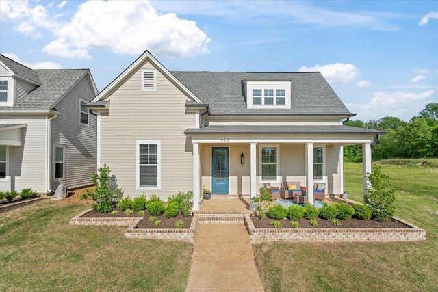 428 Catawba Valley Dr, Collierville, TN 38017 - view of front of house with a porch, a shingled roof, and a front lawn