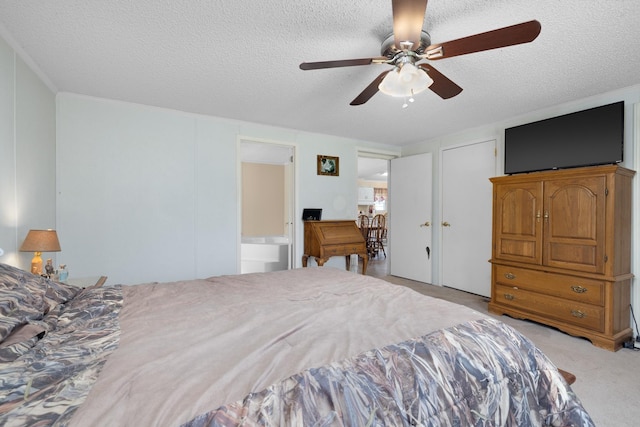 bedroom with light carpet, a textured ceiling, and ceiling fan