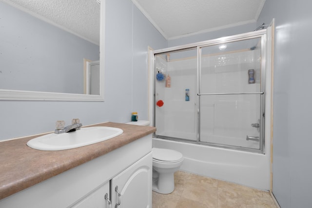 bathroom with toilet, ornamental molding, vanity, and a textured ceiling