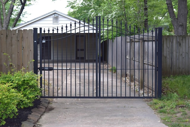 view of gate with fence private yard