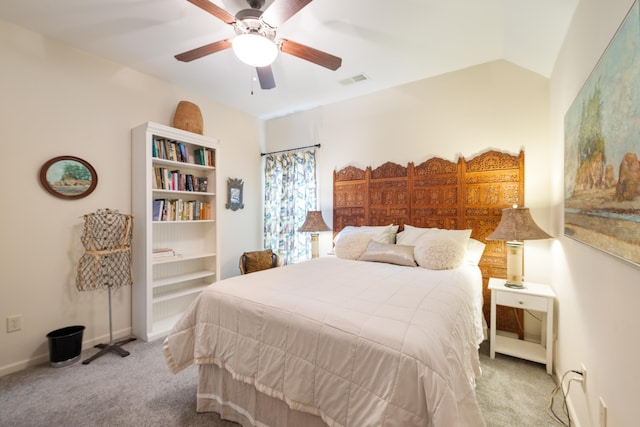 carpeted bedroom featuring visible vents, baseboards, and ceiling fan
