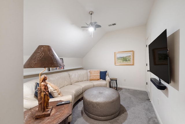 carpeted living room featuring lofted ceiling, a ceiling fan, visible vents, and baseboards