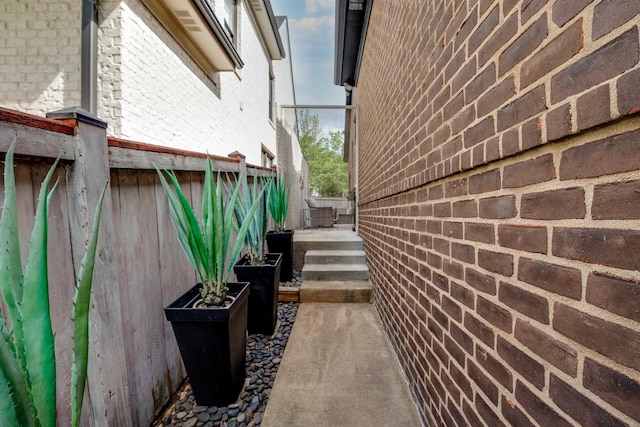 view of home's exterior with brick siding