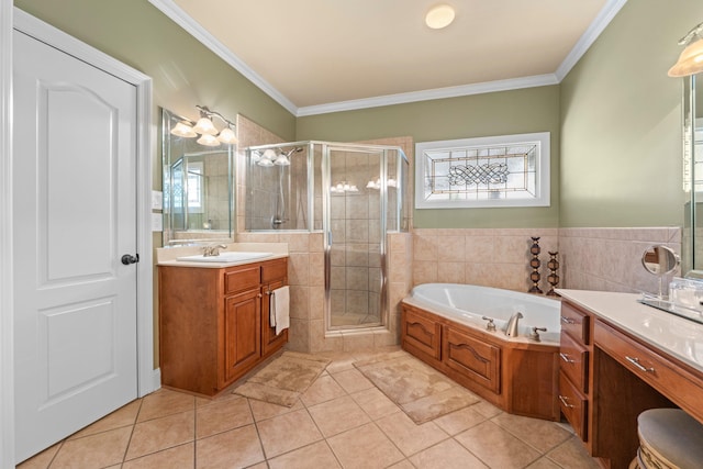 93 Eagle Glade Cv, Cordova, TN 38018 - full bathroom with a garden tub, a shower stall, ornamental molding, and tile patterned flooring