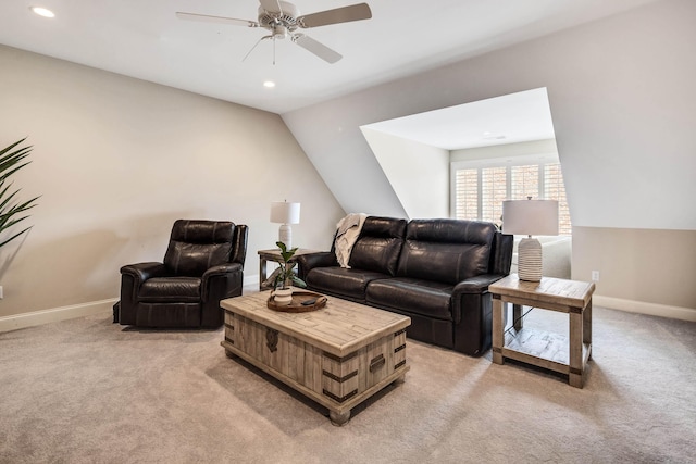 living area with baseboards, recessed lighting, light carpet, and a ceiling fan