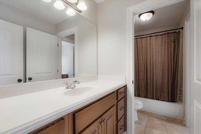 full bathroom featuring shower / bath combo, toilet, and vanity