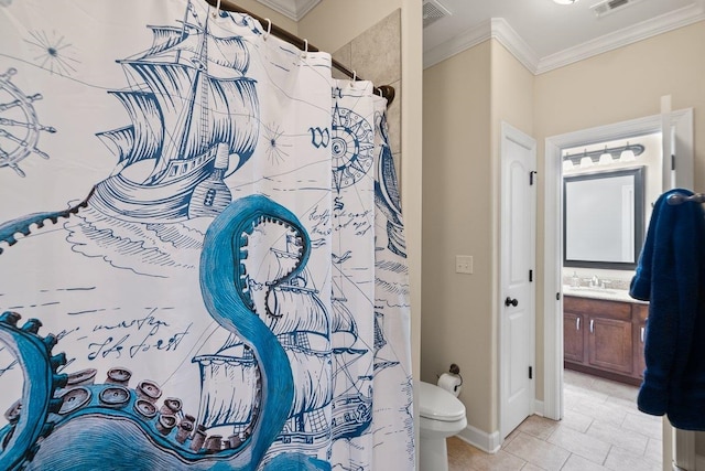 bathroom with vanity, toilet, visible vents, baseboards, and ornamental molding