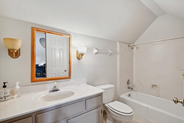 bathroom featuring toilet, tub / shower combination, vaulted ceiling, and vanity