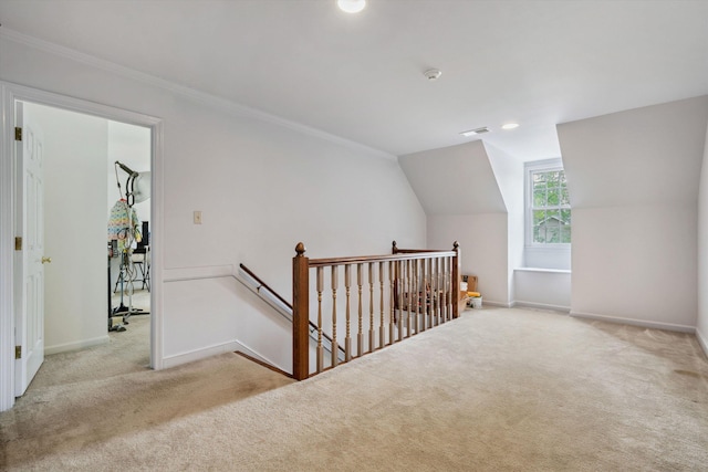 additional living space featuring recessed lighting, vaulted ceiling, carpet flooring, baseboards, and visible vents