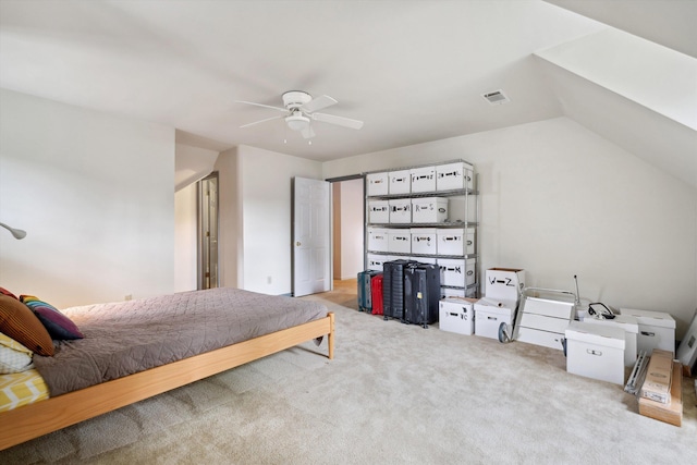carpeted bedroom with ceiling fan and visible vents