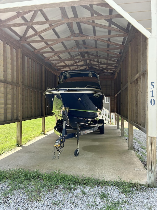 view of parking / parking lot with a carport