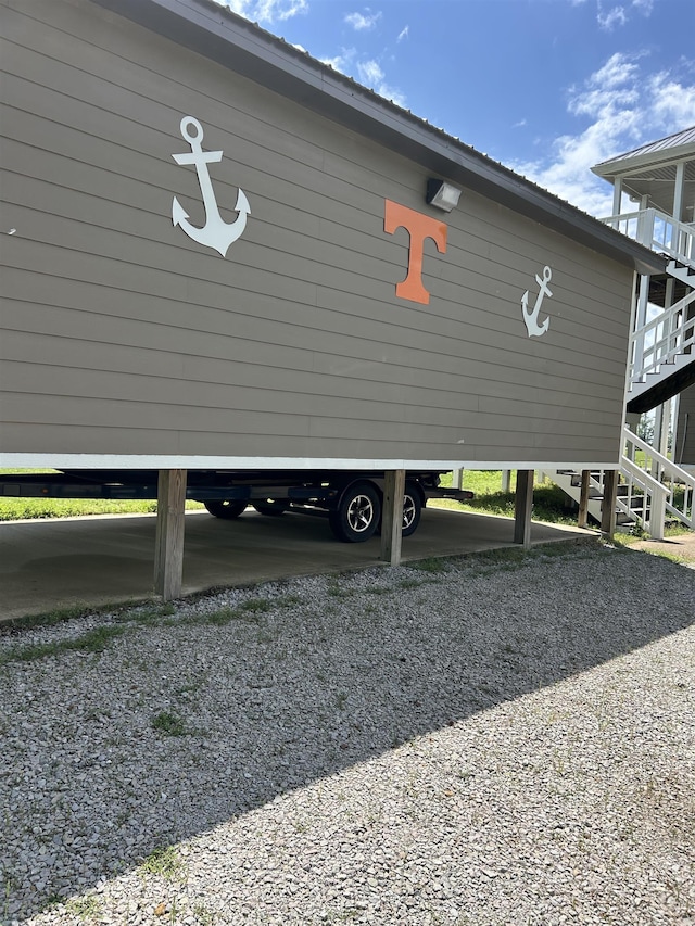 view of parking featuring stairs
