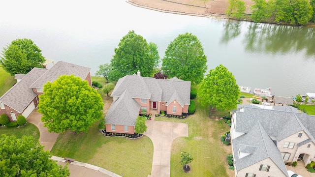 birds eye view of property featuring a residential view and a water view