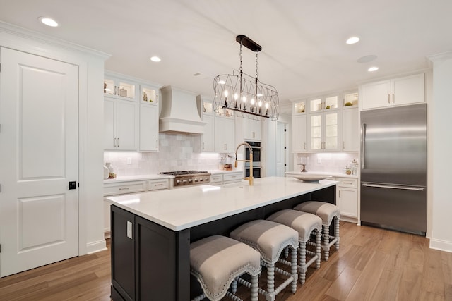 515 Saunders Creek Cir, Rossville, TN 38066 - kitchen featuring custom exhaust hood, tasteful backsplash, stainless steel appliances, and light countertops