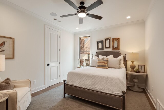 515 Saunders Creek Cir, Rossville, TN 38066 - bedroom featuring wood finished floors, visible vents, crown molding, and baseboards