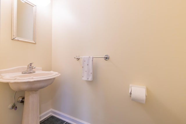 bathroom with baseboards