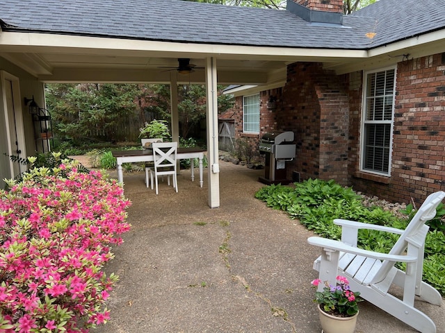 view of patio / terrace with a ceiling fan and area for grilling
