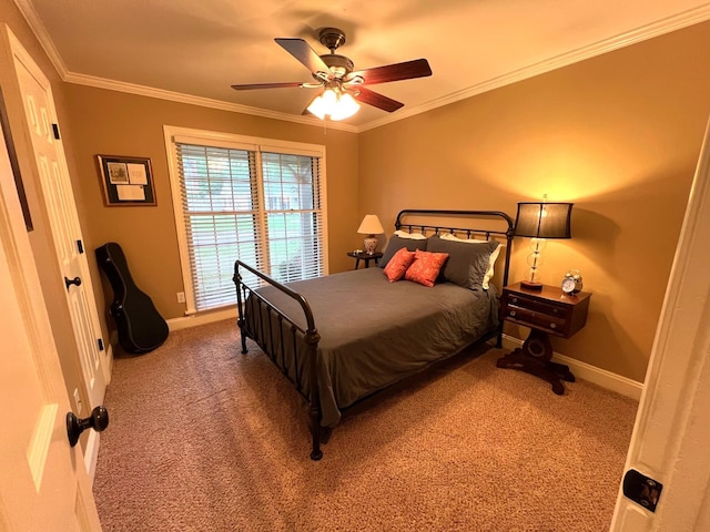 bedroom featuring carpet floors, baseboards, and crown molding
