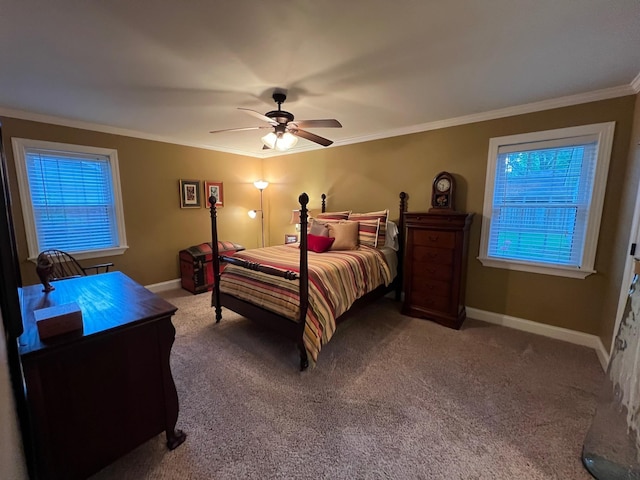 carpeted bedroom with crown molding, baseboards, and ceiling fan