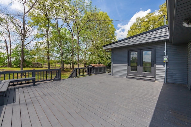 wooden deck featuring french doors