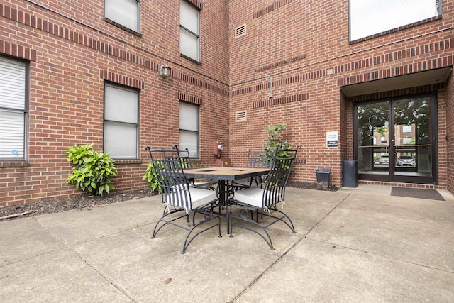 view of patio with outdoor dining area
