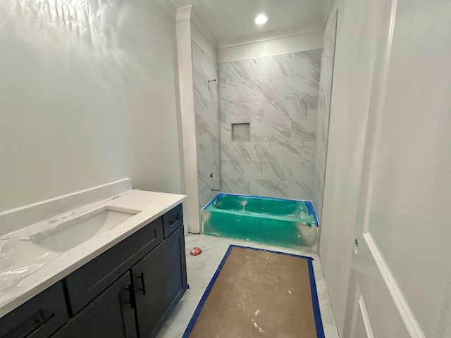 full bath featuring a shower, vanity, recessed lighting, and marble finish floor
