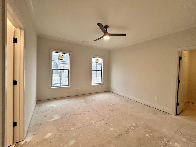spare room featuring ceiling fan, crown molding, visible vents, and baseboards