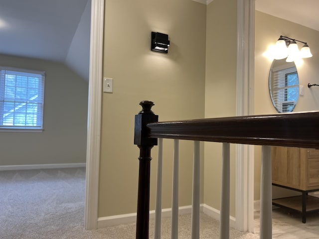 detailed view of carpet and baseboards